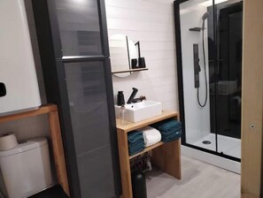 Shower, hair dryer, towels, soap