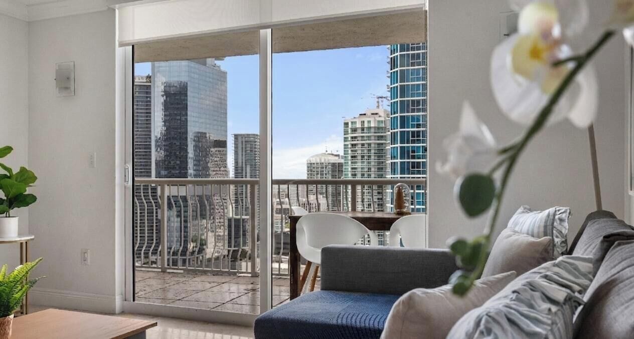 Luxury Apartment, Balcony, City View | Living area | 40-inch LED TV with cable channels