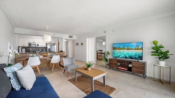 Luxury Apartment, Balcony, City View | Living area | 40-inch LED TV with cable channels