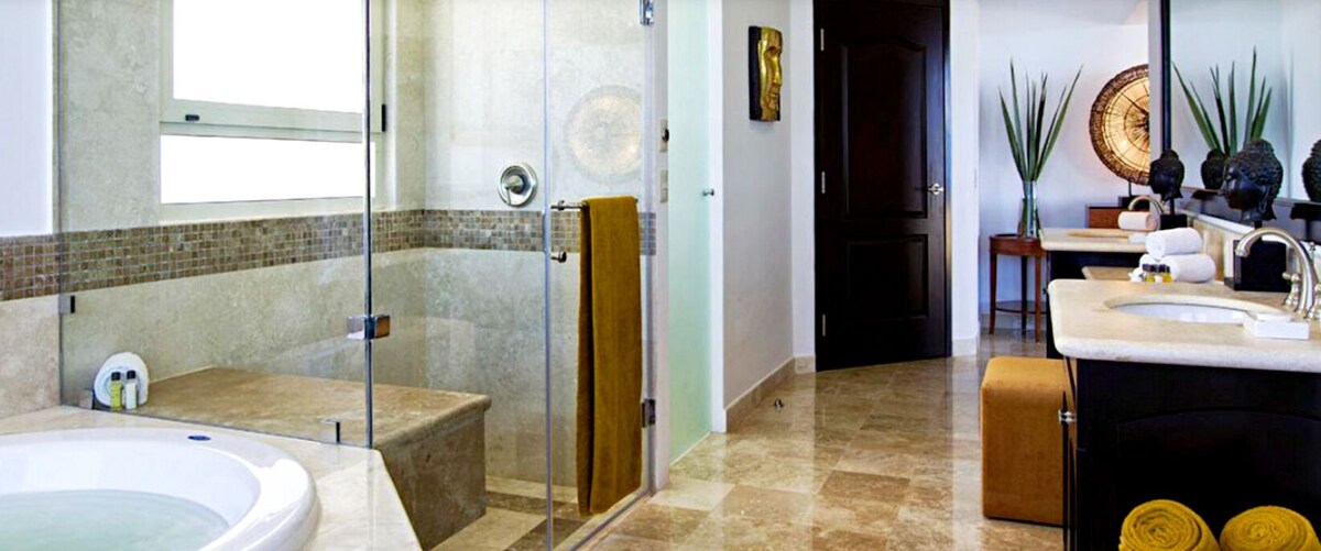 Shower, jetted tub, hair dryer, towels