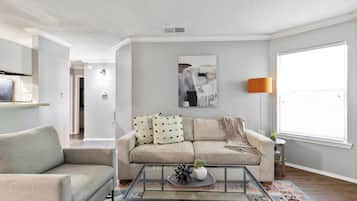 Apartment, 2 Bedrooms | Living area | 40-inch TV with digital channels