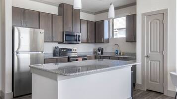 Apartment, 2 Bedrooms | Private kitchen | Full-size fridge, microwave, oven, stovetop