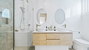 Shower, hair dryer, towels