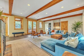 Smart TV, fireplace, books, printers