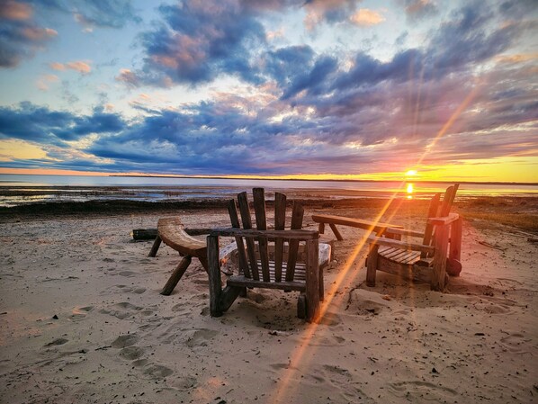 On the beach, sun-loungers, beach towels