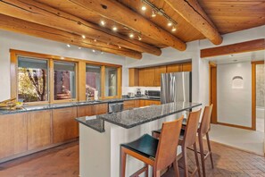 Fridge, microwave, oven, stovetop - Casa Serenata: Monthly Luxury Home, Panoramic Mountain Views near Santa Fe Opera (Santa Fe)
