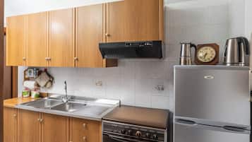 Casa | Cocina privada | Refrigerador con congelador, horno y parrilla de estufa