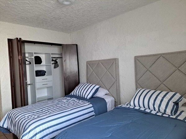 2 bedrooms, iron/ironing board, WiFi, bed sheets