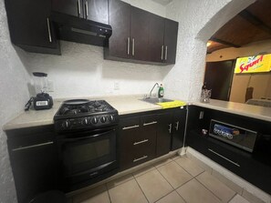 Fridge, microwave, coffee/tea maker, blender