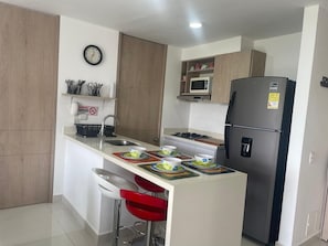 Private kitchen - Pleasant rest Swimming pools Games Nature sun 3-bedroom apartment fitness room (Ricaurte)