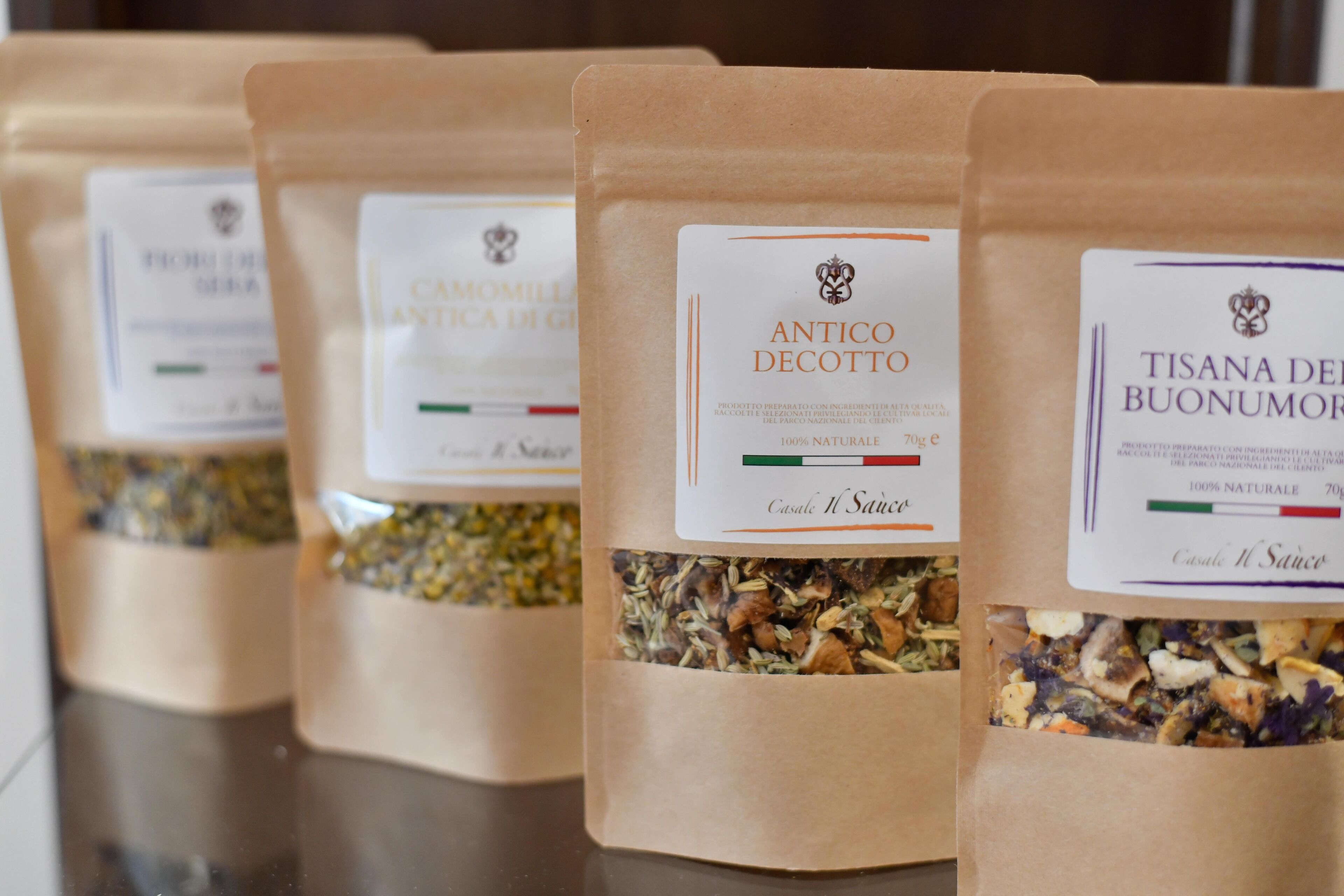 Three bags of food products with labels.