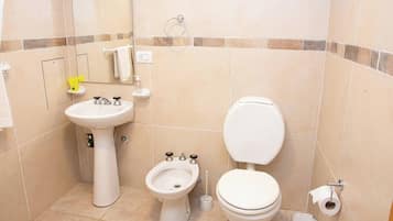 Hair dryer, bidet, towels, soap