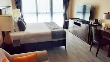 Superior Room, Ocean View | Desk, laptop workspace, blackout drapes, iron/ironing board