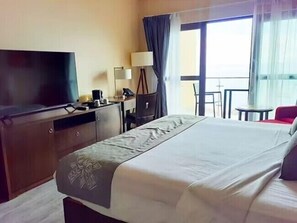 Superior Room, Ocean View | Desk, laptop workspace, blackout drapes, iron/ironing board
