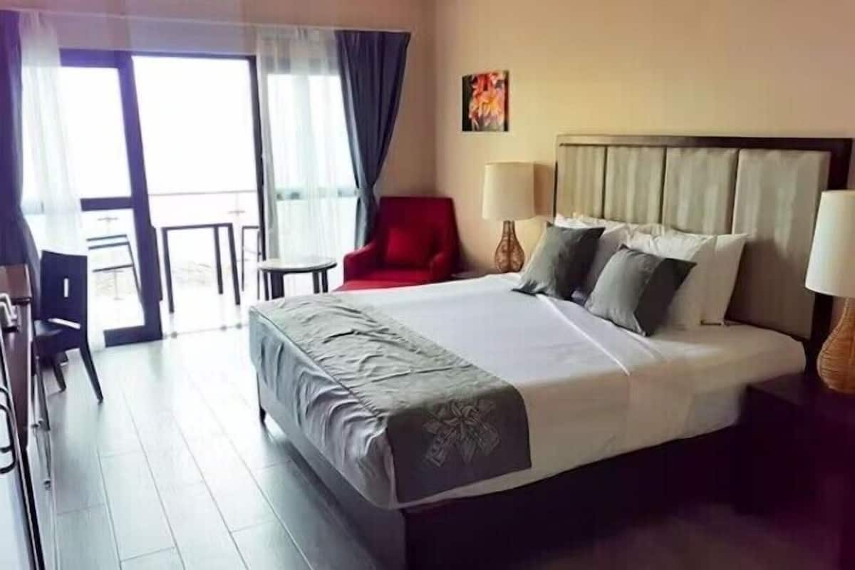 Superior Room, Ocean View | 2 bedrooms, desk, laptop workspace, blackout drapes