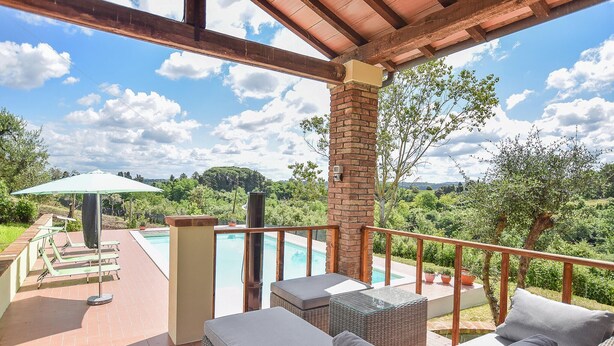 A covered outdoor area with a pool, wicker furniture, and a view of the surrounding landscape. - Cozy home in Fauglia with WiFi (Fauglia)