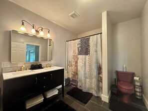 Shower, jetted tub, hair dryer, towels