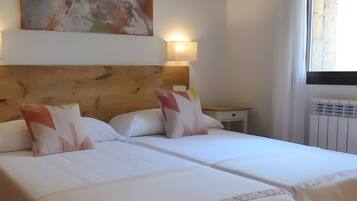 4 slaapkamers, een strijkplank/strijkijzer, gratis wifi, beddengoed