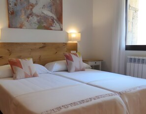 4 habitaciones, tabla de planchar con plancha y wifi gratis