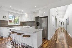 Fridge, microwave, oven, stovetop - The Beach Haven - 4 bedroom luxury house Sleeps 12-14 (Rye)