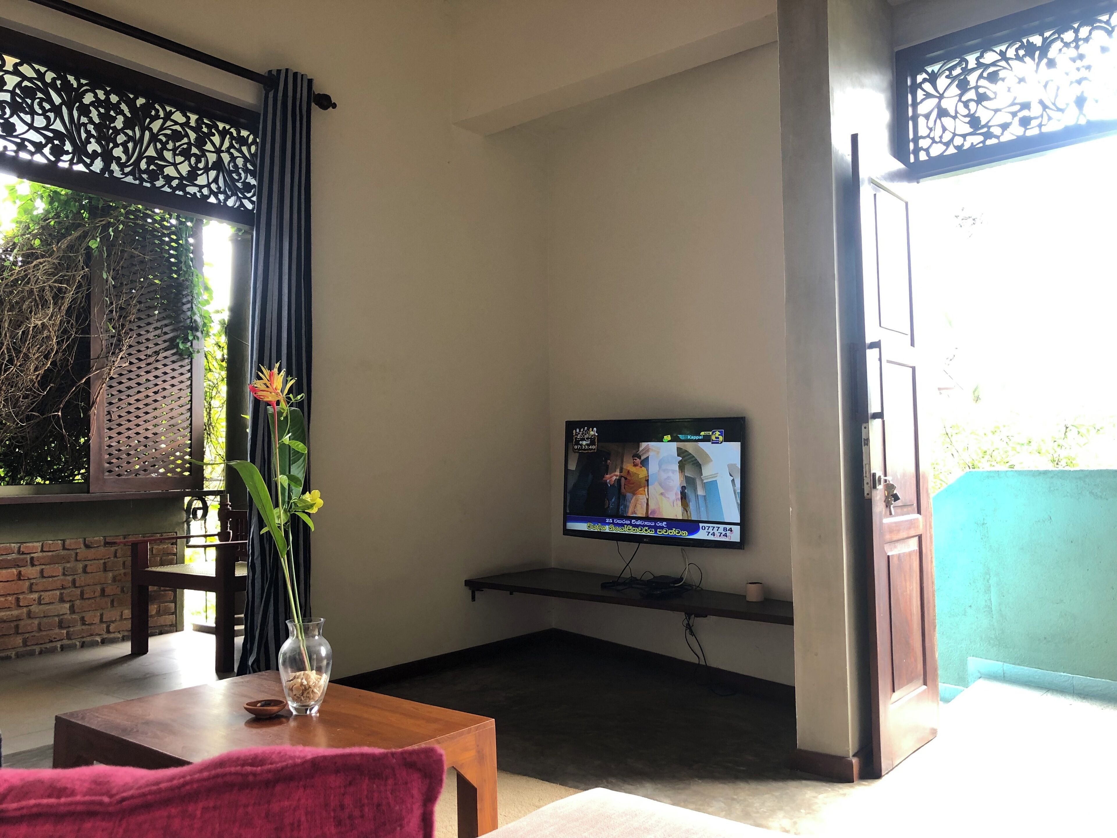 Deluxe appartement | Woonruimte | Televisie