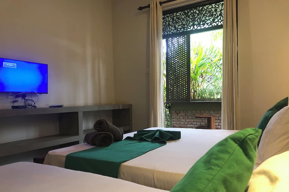 Deluxe-Dreibettzimmer
