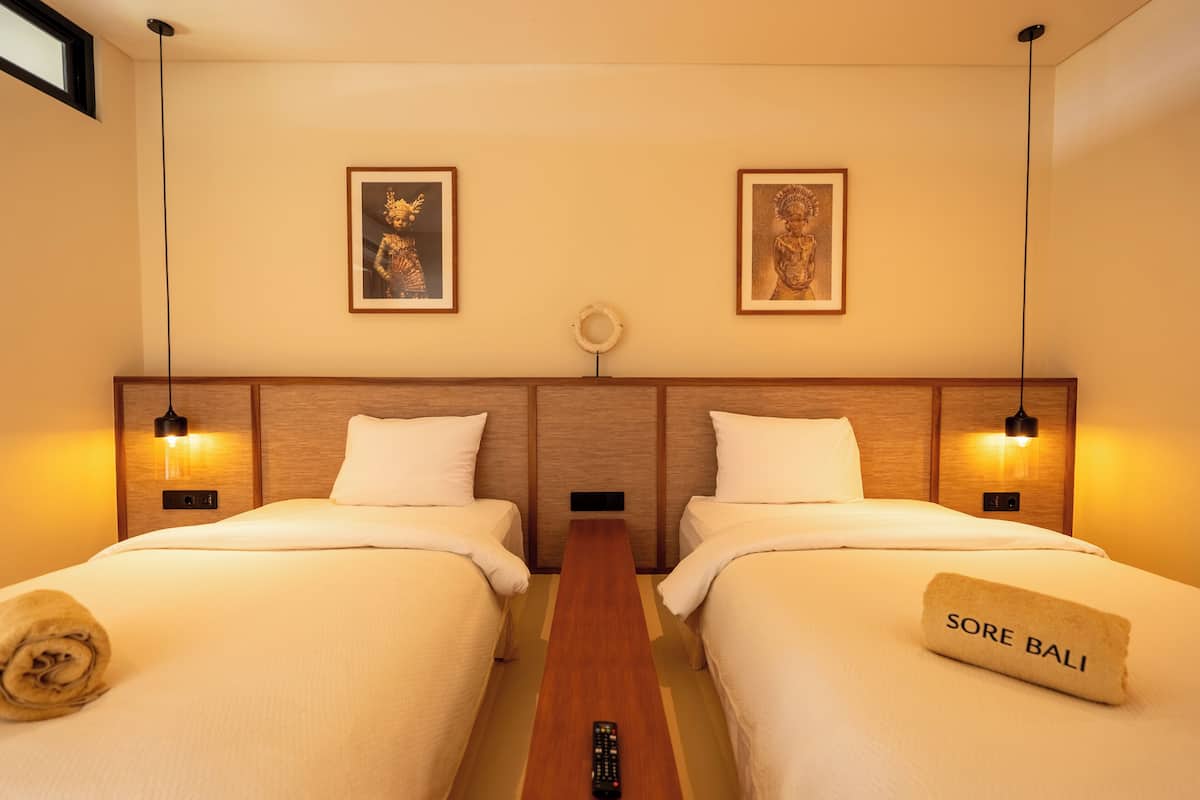 Two Bedroom Deluxe | Individually decorated, individually furnished, laptop workspace