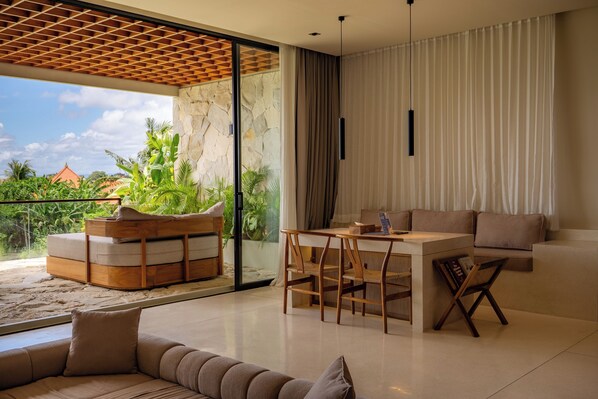 Junior Suite | Living area | 32-inch LED TV with digital channels - Sore Escape Tumbak Bayuh by Betterplace (Canggu)