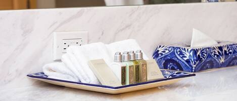 Hair dryer, towels, soap, toilet paper