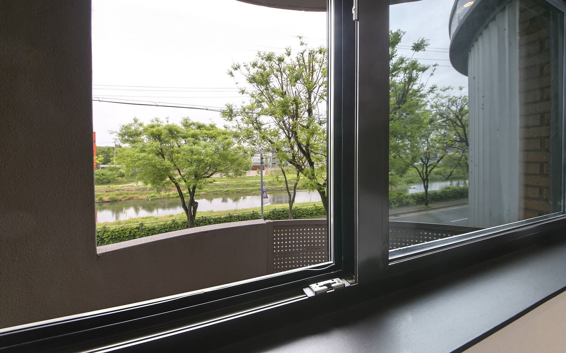 Panoramic Double Room, Non Smoking, River View | Individually decorated, individually furnished, desk, laptop workspace