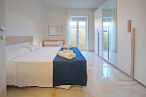 Standard House, 2 Bedrooms, Sea Facing (Villa Na' Lu' 1 with sea view) | 2 bedrooms, iron/ironing board, free WiFi, bed sheets