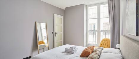 Apartment | Laptop workspace, iron/ironing board, bed sheets