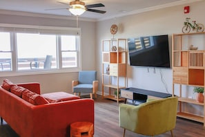 TV, offices - Sojourn 2 BR Home with Deck Access & Ocean Views (Norfolk)