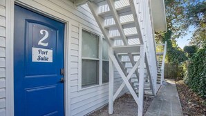 A blue door with a sign reading "Port Suite 2".