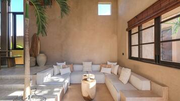 Deluxe Villa, Patio, Pool View | Living area | Flat-screen TV, Netflix, streaming services