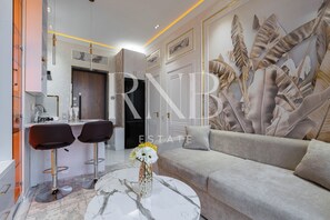 Comfort Condo, Balcony, City View | Living area - Kamolon 113 by RNB estate (Tashkent)