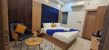 Premium bedding, desk, laptop workspace, blackout curtains