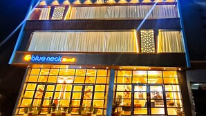 A two-story building with a sign reading "Blue Neck." - BlueNeck Ayodhya-Near ShriRam Mandir (Faizabad)