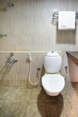 Deluxe Room | Bathroom | Shower, towels - Stayz Inn near Marina Beach (Chennai)