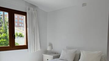 2 dormitorios, tabla de planchar con plancha, wifi y ropa de cama