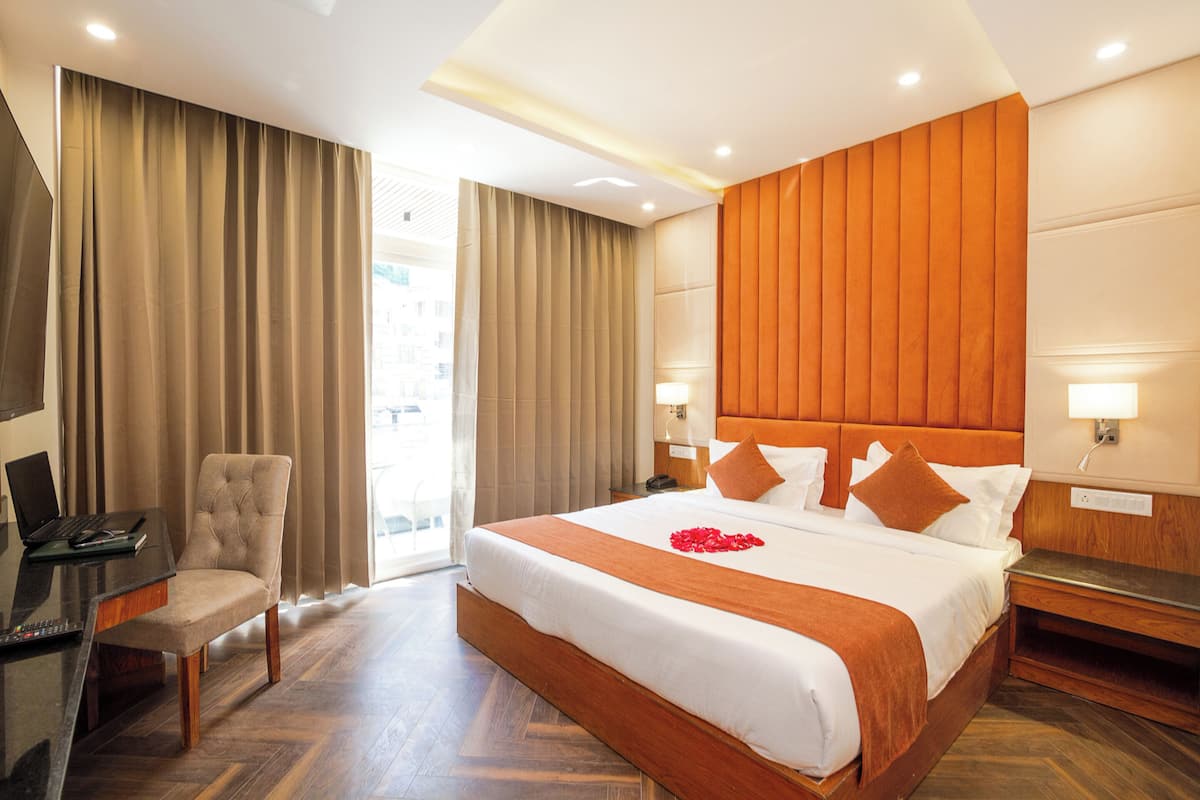 Suite familiar, 2 habitaciones, balcón, vista a la montaña | Ropa de cama de alta calidad y minibar