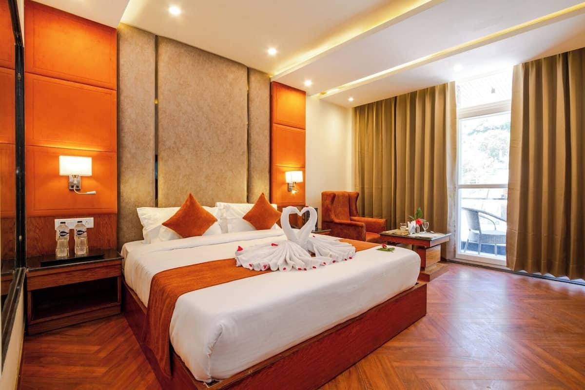 Habitación ejecutiva | Ropa de cama de alta calidad y minibar
