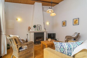 TV, fireplace - Can Clavell - Villa With Private Pool. Free Wifi (Colonia De Sant Pere (artà), Illes Balears)