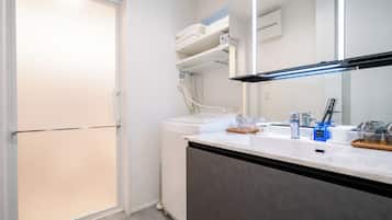 Hair dryer, bidet, towels, soap