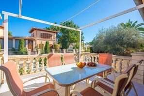 Outdoor dining - North House - House In Platja De Muro. Free Wifi (, Illes Balears)