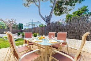 Outdoor dining - North House - House In Platja De Muro. Free Wifi (, Illes Balears)
