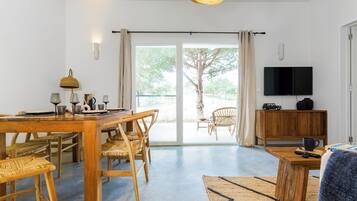 Comfort Apartment, Garden View | Living area