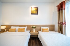 Deluxe Triple Room, Balcony | Minibar, in-room safe, desk, blackout drapes - Shine Hue Hotel 2  (Hue)