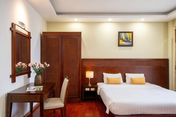 Deluxe Quadruple Room, City View | Minibar, in-room safe, desk, blackout drapes - Shine Hue Hotel 2  (Hue)