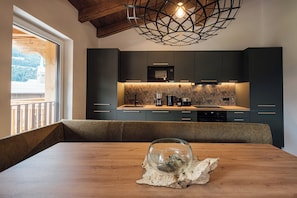 Apartment, 4 Bedrooms | Private kitchen | Full-size fridge, oven, stovetop, dishwasher